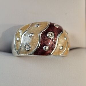 Elegant Silver and Gold Wave Ring